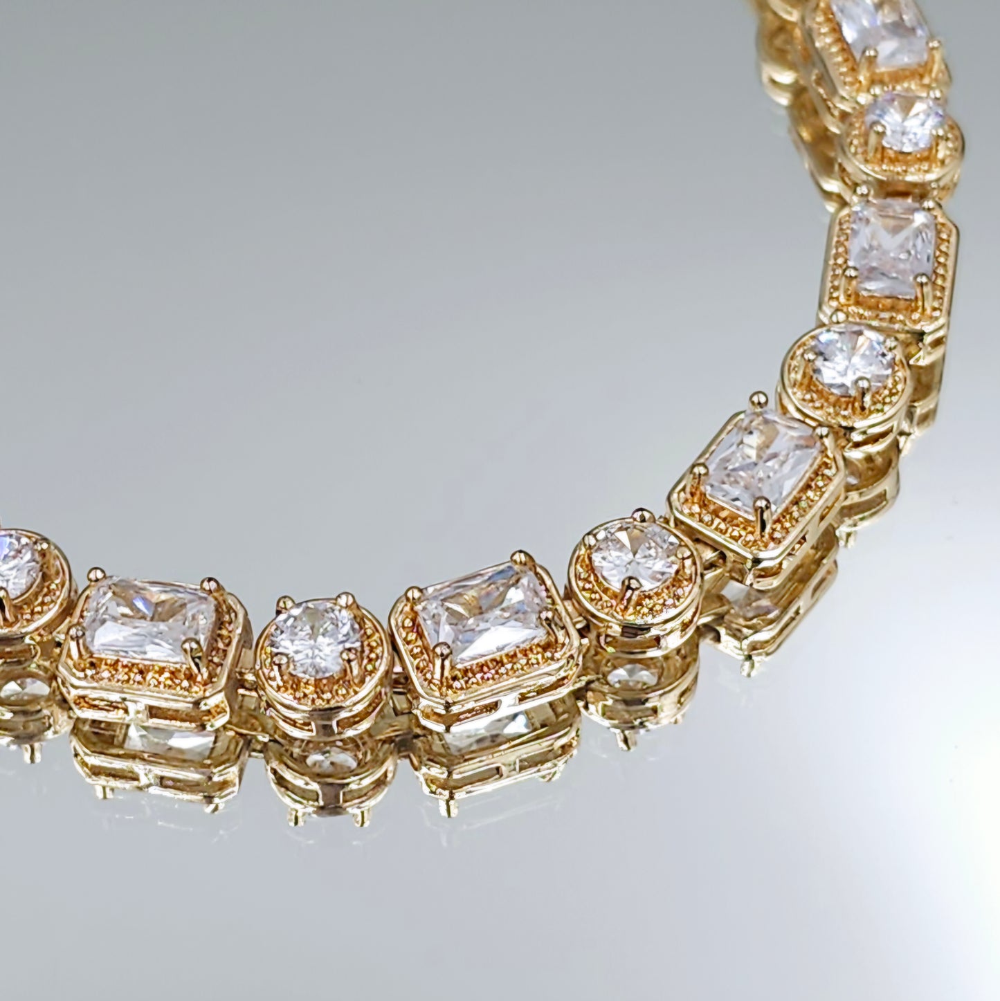 Gold Emerald Cut Halo Bracelet