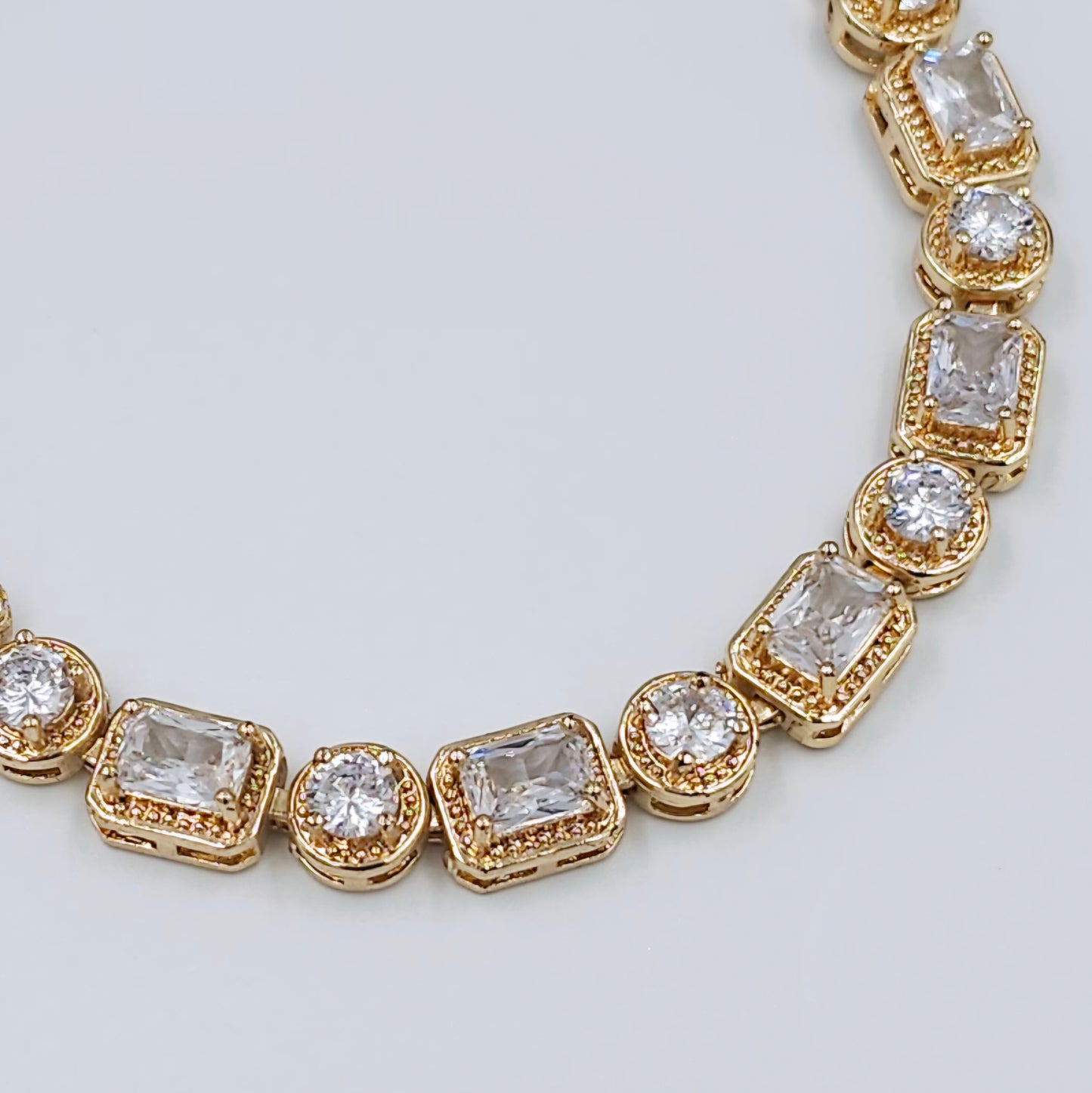 Gold Emerald Cut Halo Bracelet